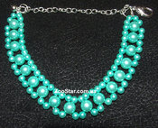 Ожерелье жемчужное трехрядное  "Волшебство" зеленое